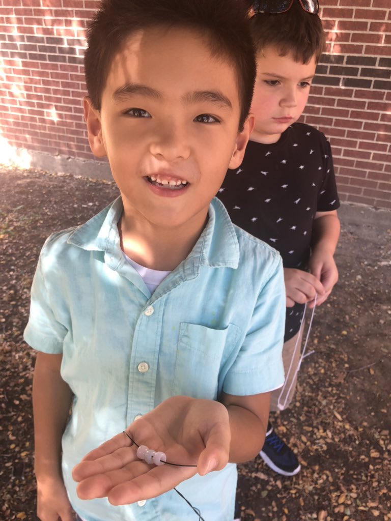 evelynbkane's tweet photo. My first graders had fun learning about light energy today! We took our white solar beads outside to see what happens in natural light. They turned colors! #NISDScience #firsties @HatfieldElem https://t.co/HMRFzLVUVo