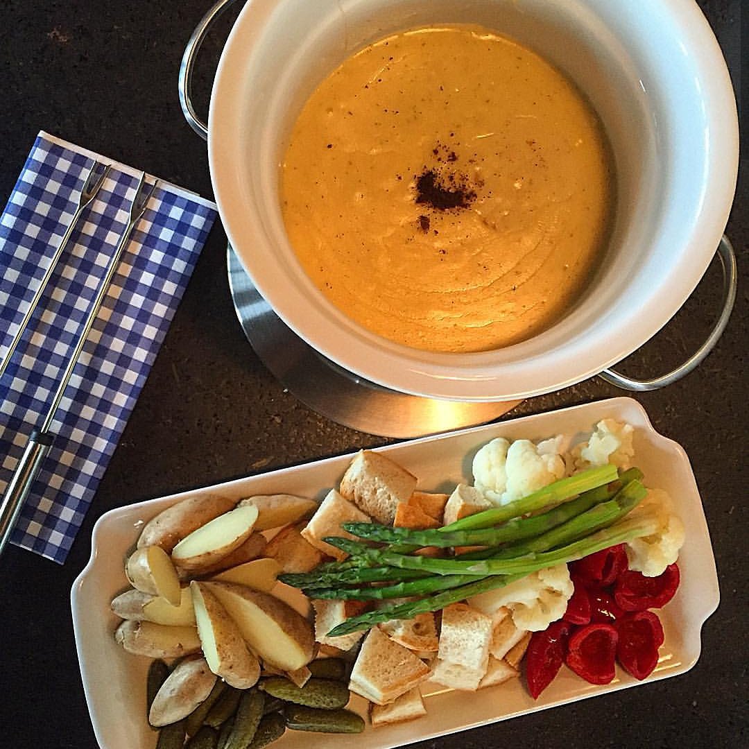 Chilly days call for a cozy night of half-priced wine and Cheese and Chocolate Fondue