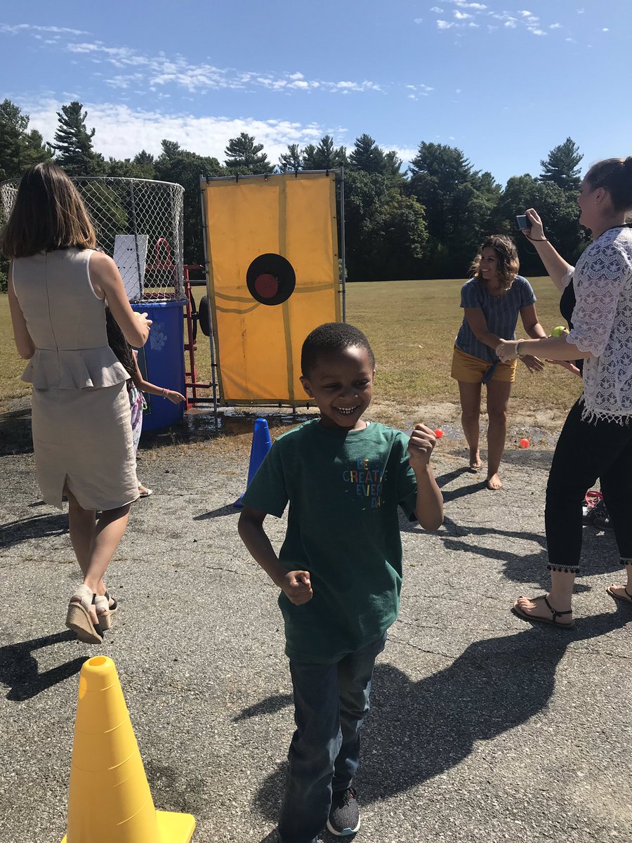 ETelementary's tweet photo. Thank you superintendent Cabral for being a good sport and allowing each & every ET student to take a shot at dunking you today as we celebrated reaching our reading goals! #hollywoodday #dunktank #readingsuperstars @Taunton_Schools https://t.co/XJgIdlo7wB