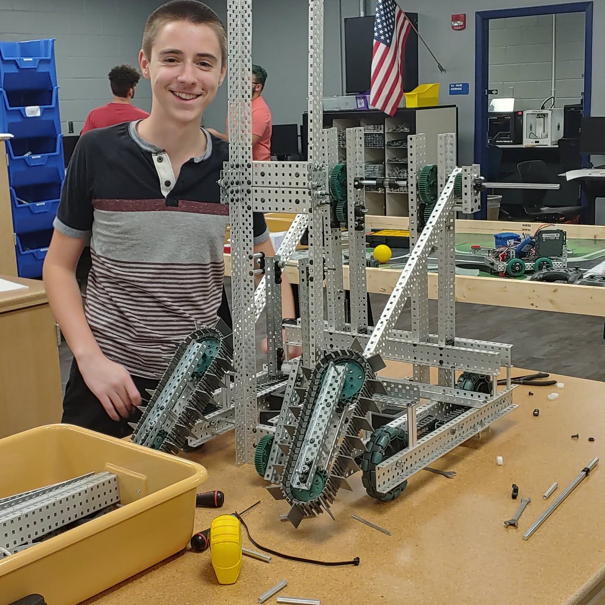 The robot for the upcoming VEX competition is coming along nicely! Thank you Ryan for posing with the robot.