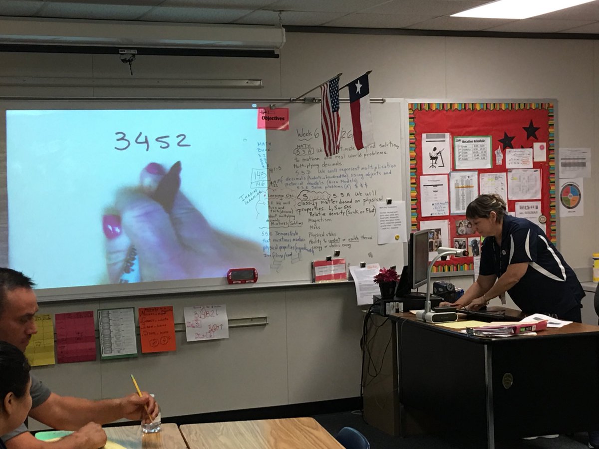 lmamerson's tweet image. Math class for ⁦@ErmelElm⁩ parents! Finding decimals! Principal Escalante and her team did a phenomenal job! Parents are teachers, too! Engagement is totally different than involvement! ⁦@KatyRoede⁩ #TeacherModeling #FamilyEngagementNight #DualCapacityFramework