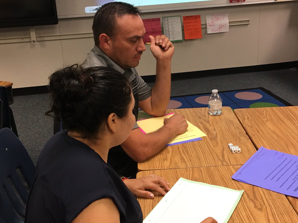lmamerson's tweet image. Math class for ⁦@ErmelElm⁩ parents! Finding decimals! Principal Escalante and her team did a phenomenal job! Parents are teachers, too! Engagement is totally different than involvement! ⁦@KatyRoede⁩ #TeacherModeling #FamilyEngagementNight #DualCapacityFramework