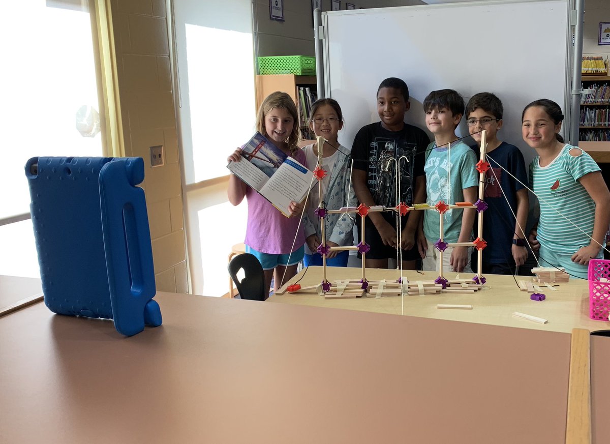 Caught these students using the self-timer on one of our iPads to take a selfie of their finished bridge today. Seeing students this PROUD of their work means everything!!!! Ps: they also asked me to share their photo :) #sharingourstory #bestyearyet <a href="/SymmesElem/">Symmes Elementary</a>