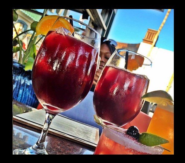 🍹Thirsty Thursday Cocktail Hour🍹 This is Jamaican me want one-a fun mix of fruity flavors to satisfy any sweet tooth. 
JAMAICAN SANGRIA:
Appleton 12 Year Rum
Kirk &amp; Sweeny Rum
Dark Horse Cabernet Sauvignon
Crème de Pêche 
Framboise
Orange Juice
Honey Syrup 

📷: @_onepinkrose