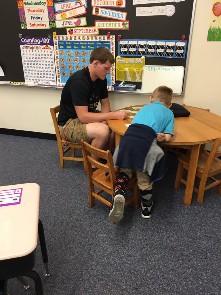 SandmanGrade1's tweet photo. It’s awesome when a Little Giant varsity football player is also a National Honor Society tutor and comes to listen to first graders read!@Westview66 #westviewproud https://t.co/BHeboamOVI
