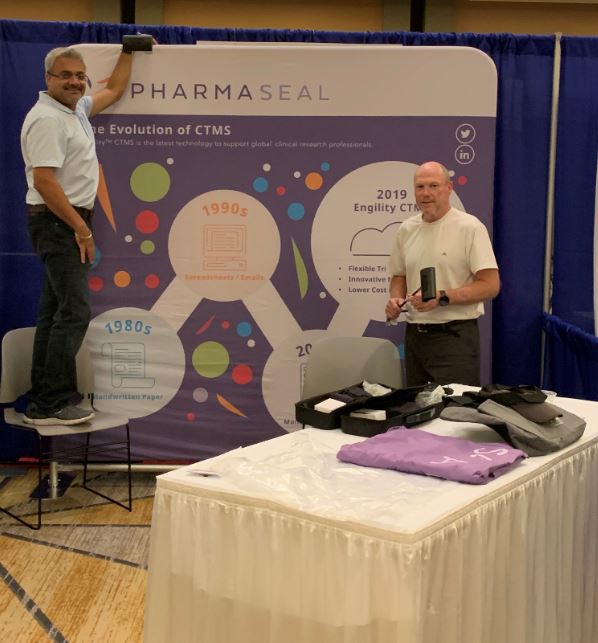 pharmaseal's tweet photo. Daljit and Mike setting up for US SOCRA, the first show for PHARMASEAL! Captions for the photo welcome? #SOCRA2019 #pharmaseal #ctmsexperts https://t.co/vMmUnIeo5z