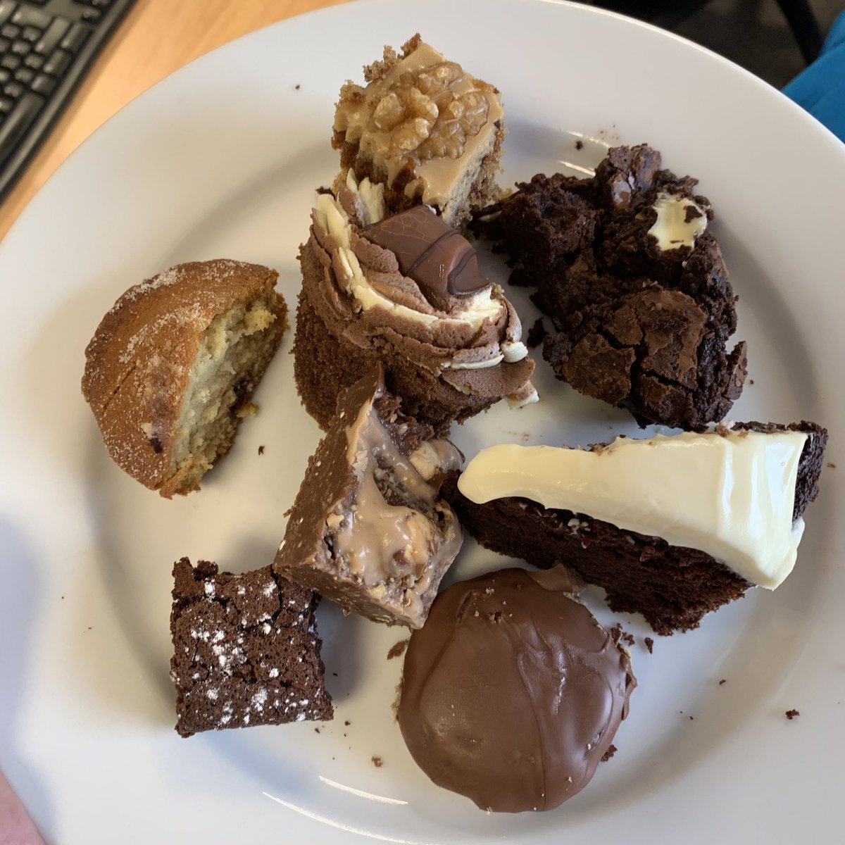 A steady morning of Cake at the @ABCTeachersTES HQ! 

I conquered Jaffa Cakes finally. Not the prettiest, but surprisingly satisfying! The Jaffa Cakes that is...

#MacMillanCoffeeMorning