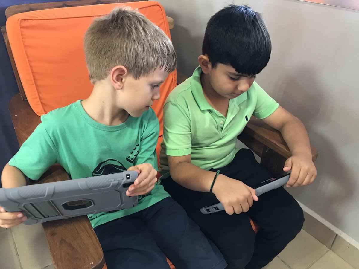 Love this! @istafrica Grade 2 students figuring out GarageBand features to create their own music during iTime #istafricalearns #inquiry @RehanaJasani #theydontneedus