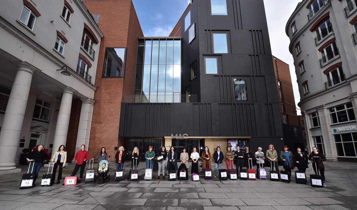 All4Choice's tweet photo. The cast of #nowforthenorth organised a perfomance art piece of 21 people with suitcases, the number who travel every week from NI to access abortion in GB. They were also pictured outside the courts because abortion is criminalised.
#healthcarenotairfare #MyAbortionMyHealth https://t.co/FgCK3mJhYL