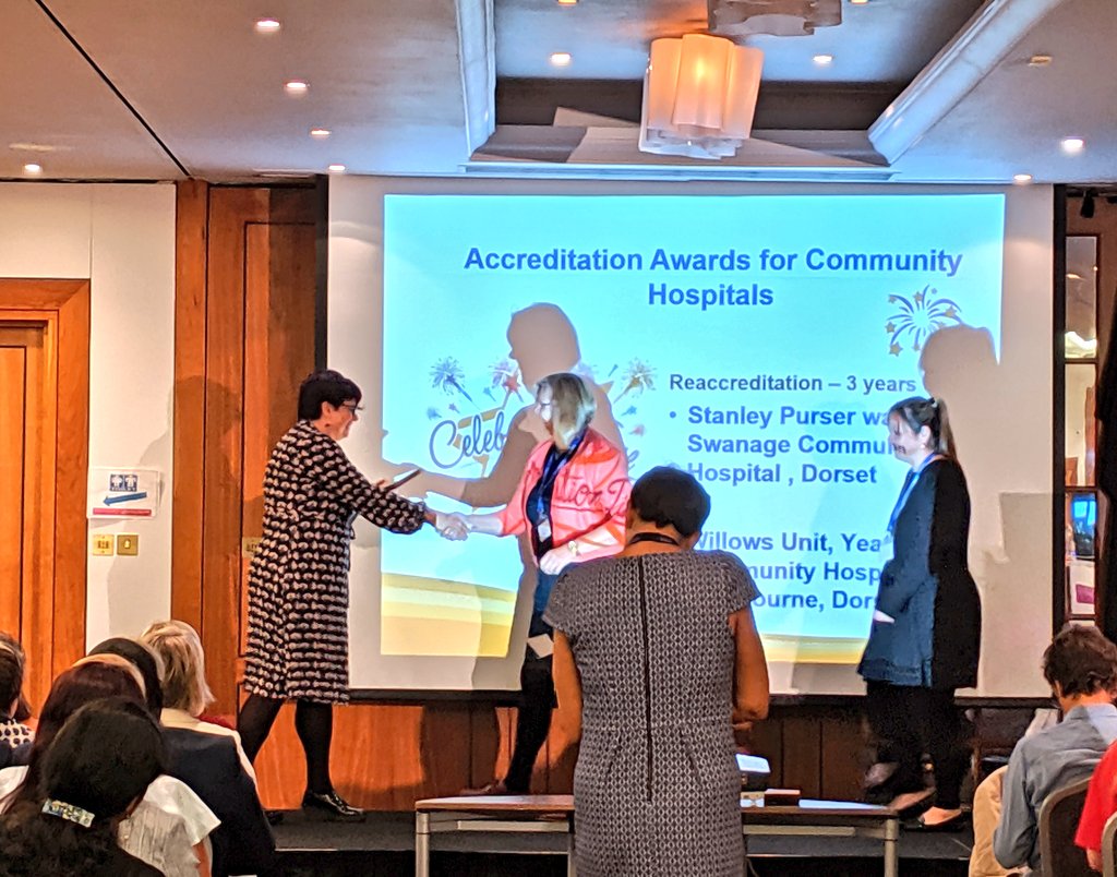 GeriSoc's tweet photo. BGS End of Life Care Co-Lead @premzf presents @GSFCentre Accreditation Awards for Community Hospitals #GSFConf19 https://t.co/2CmlNNjrjq