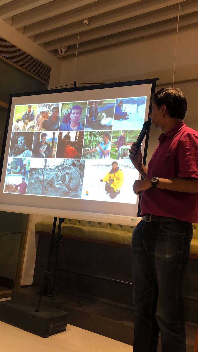 NGTIndia's tweet photo. At the #NGTMeetup, Chari Vijayaraghavan talks about offsetting travel pollution—some things you have to compromise on, but some you can implement. This is a slide of the many animal species he’s adopted in a bid for conservation. #ResponsibleTravel #SustainabaleTravel https://t.co/Pz6wbP8LlN