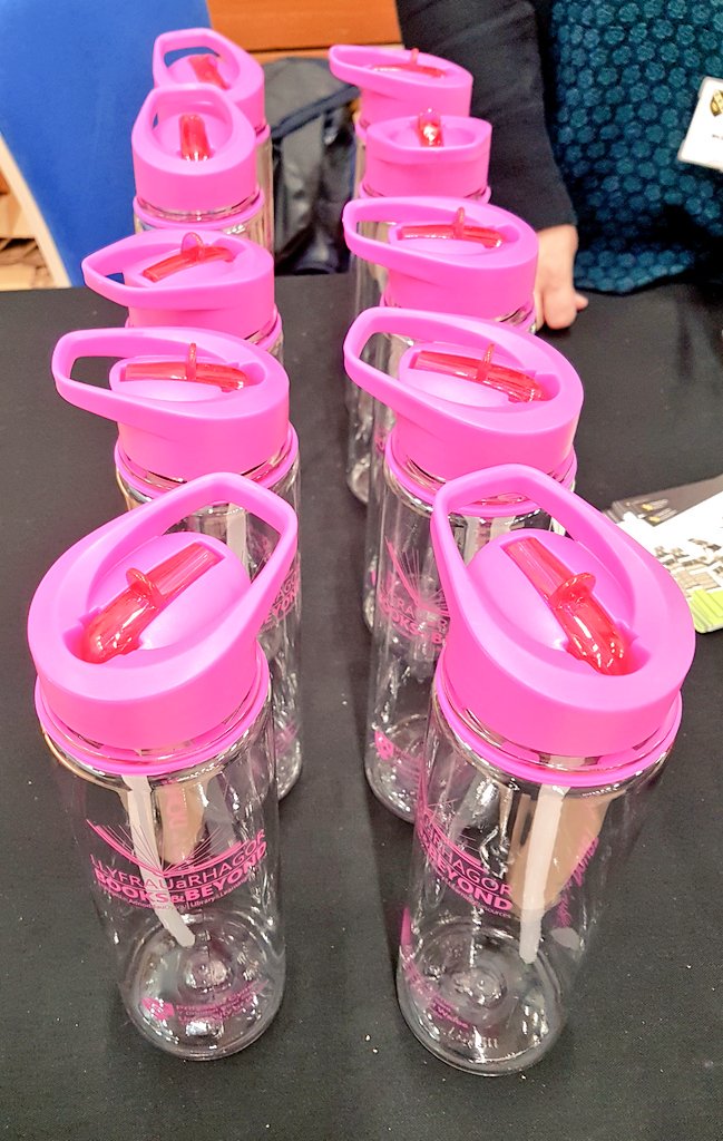 StudyUWTSD's tweet photo. Bottles, books &amp; beyond. . .  Second year @fineartswansea student Phoebe Taylor &amp; lovely @UWTSDLib staff enjoy a chat at the #Swansea Welcome Fair at the LC2. Explore what the library service has to offer @uwtsd. https://t.co/FYVXACAyDR