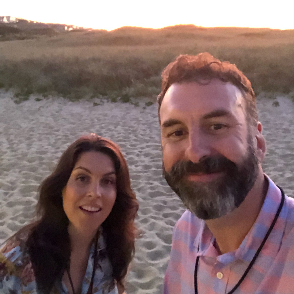 Braunger's tweet photo. Happy Friday. Hereโs us on the beach the moment a nuclear blast hit offshore. We got off a selfie just before we were vaporized, but forgot to take off our laminates ๐ก. Ainโt that always the way? #nantucketproject #nuclearbomb #marriage #selfie #beach #vaporized #friday #getlit https://t.co/xpKXcdxozt