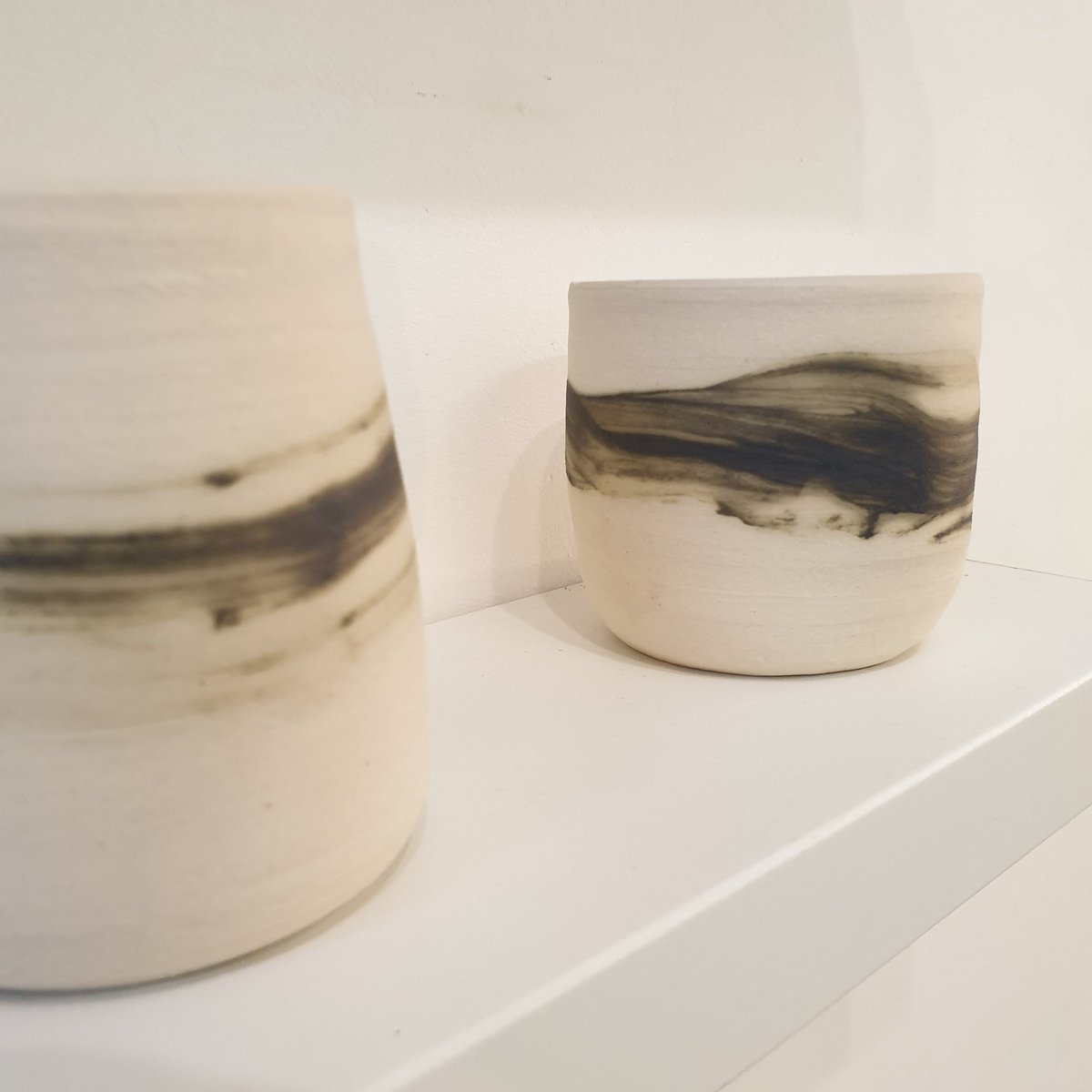 artists_maze's tweet photo. For #alchemybristol exhibition at @CentrespaceBS1, Dec Vozza has made 100 yunomi-esque cups, from a one-pound ball of clay, which are beautiful in their simplicity. Each piece has been numbered allowing one to see the development, as well as the wax and wane of the artist's mood https://t.co/jnIkeGdk8X