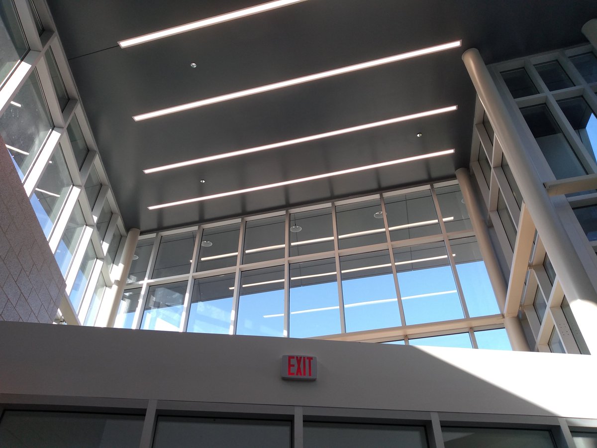 ChampionCtr's tweet photo. A large glass entryway welcomes visitors to the facility. Many large sets of windows throughout the facility provide natural light and outdoor views. https://t.co/bFUfHavDX0