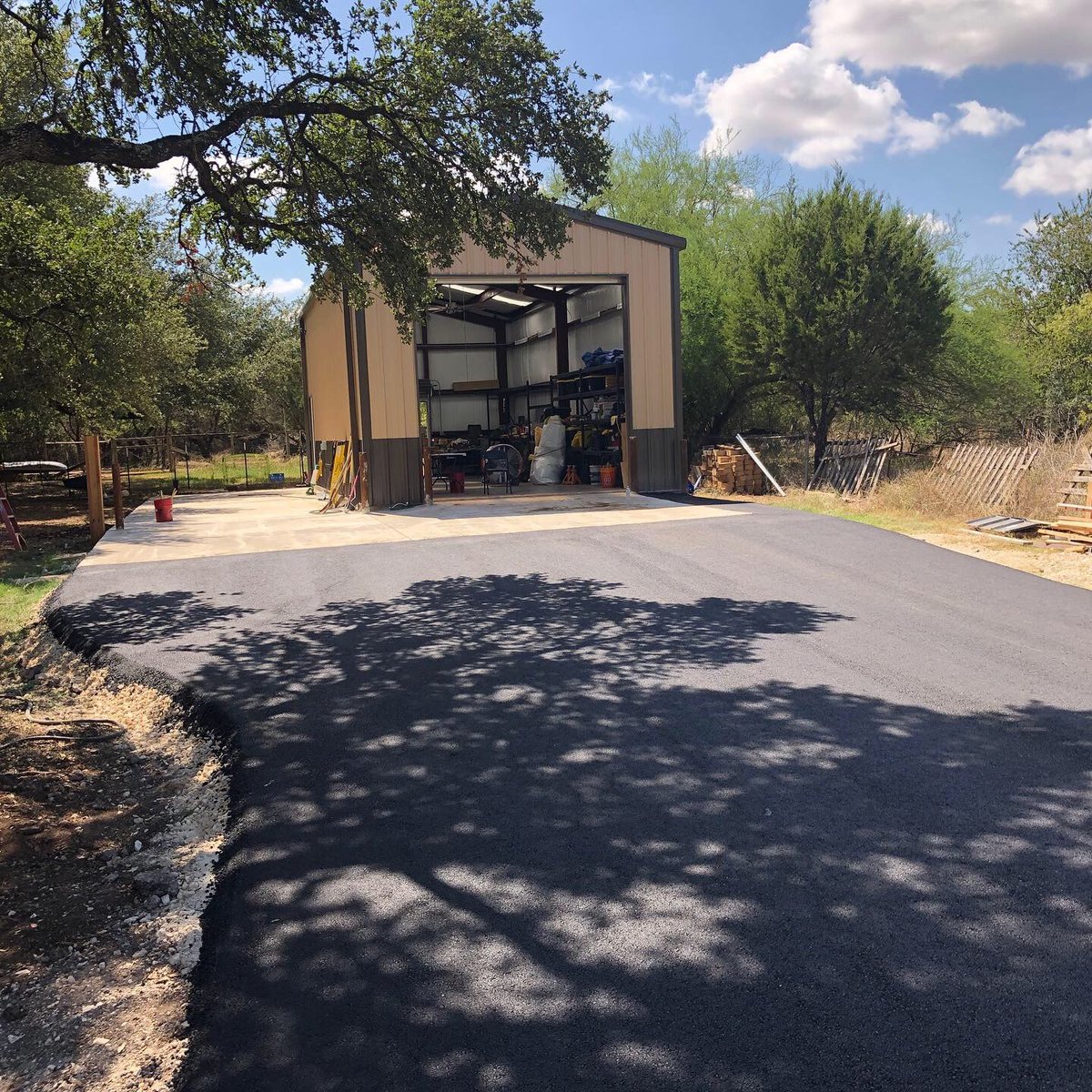 asphaltchipseal's tweet photo. Asphalt install is complete for this customer who requested an asphalt driveway leading up to their work shop. Now, they can enjoy a clean, smooth driveway in their work space area. #asphalt #asphaltpaving #drivewaycontractor #workspace https://t.co/sgH6JiFvrE