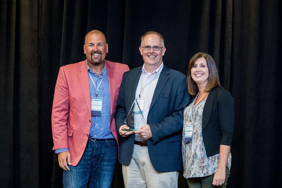 i2iPopHealth's tweet photo. A lighthouse provides a guiding beacon of light.Β USA Health is eager to improve patient care through data driven solutions. #i2iUC2019 Lighthouse Award recipient, @usaunivhospital, provides a beacon of light, guiding the health of their patient population. #datainsightaction https://t.co/Xg9todYu1Z