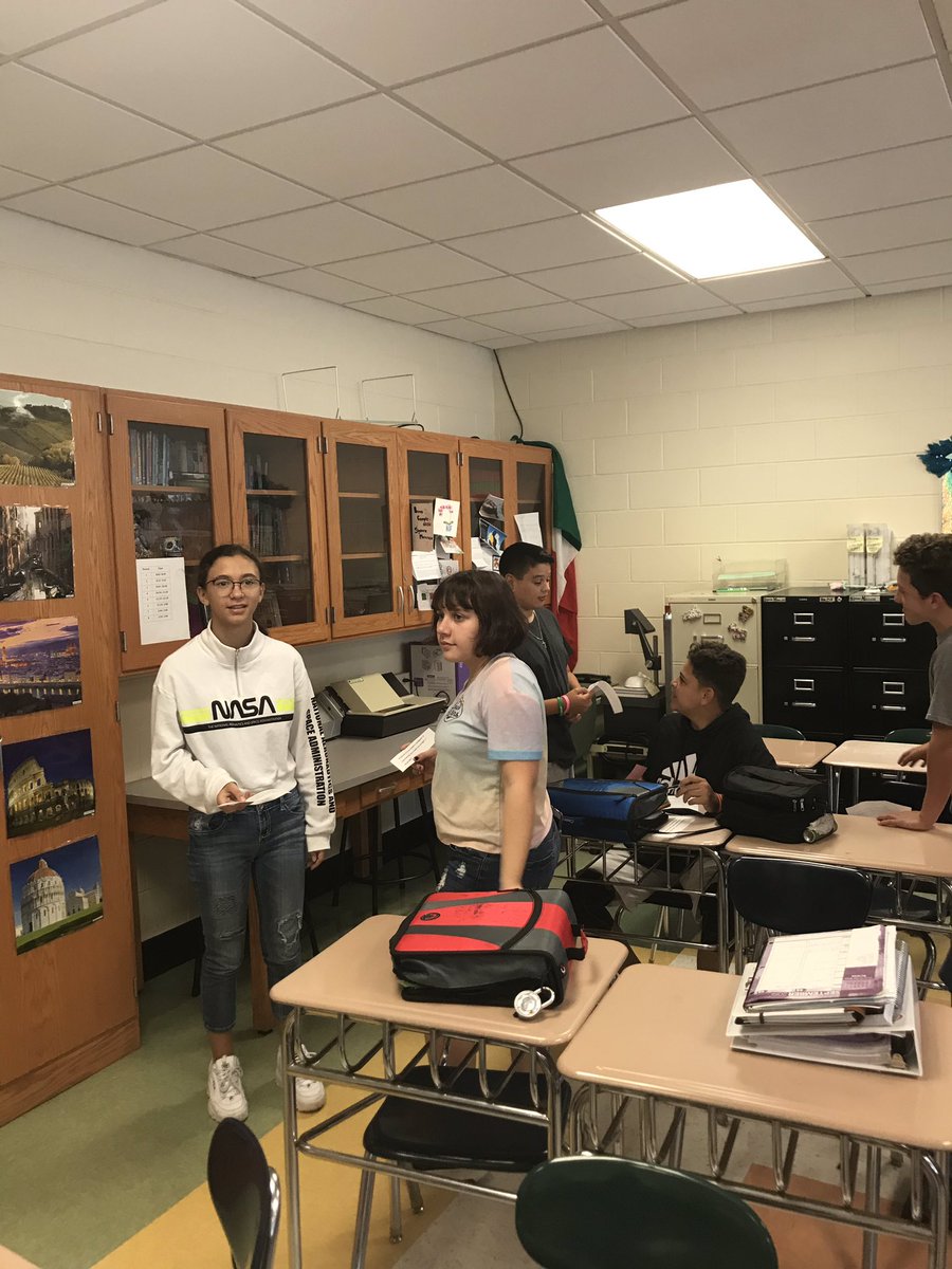 8th grade Italian students get character cards and have to ask questions of their classmates in the target language in order to "reunite" with their family members.