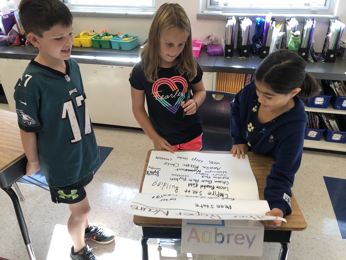 Working together to write different proper nouns! We are trying our best to remember proper nouns start with capital letters!!