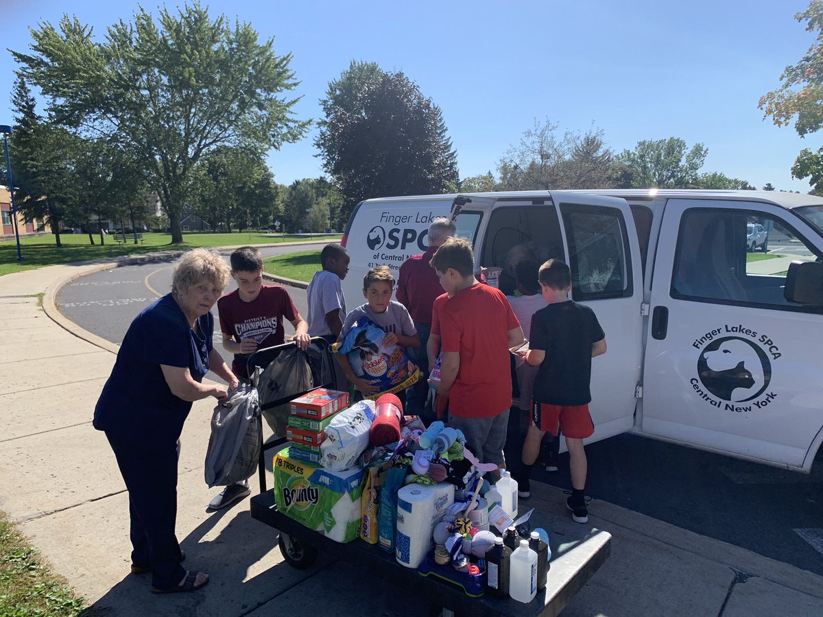 auburn_owasco's tweet photo. Sixth graders help to load the SPCA van with all the food and supplies our school collected this week. #amazinggenerosity #community #givingbackrocks #OESpride https://t.co/uohvSnb9WY
