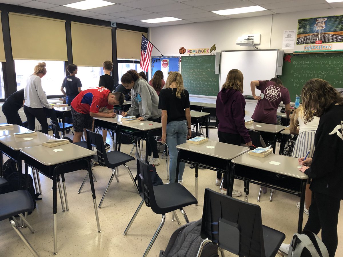 CandaceMcCaffr9's tweet image. Students engaged in a silent discussion, asking and answering questions using post-it’s. They did great! #eighthgrade #englishclass #teachingliterature #pvpanthers