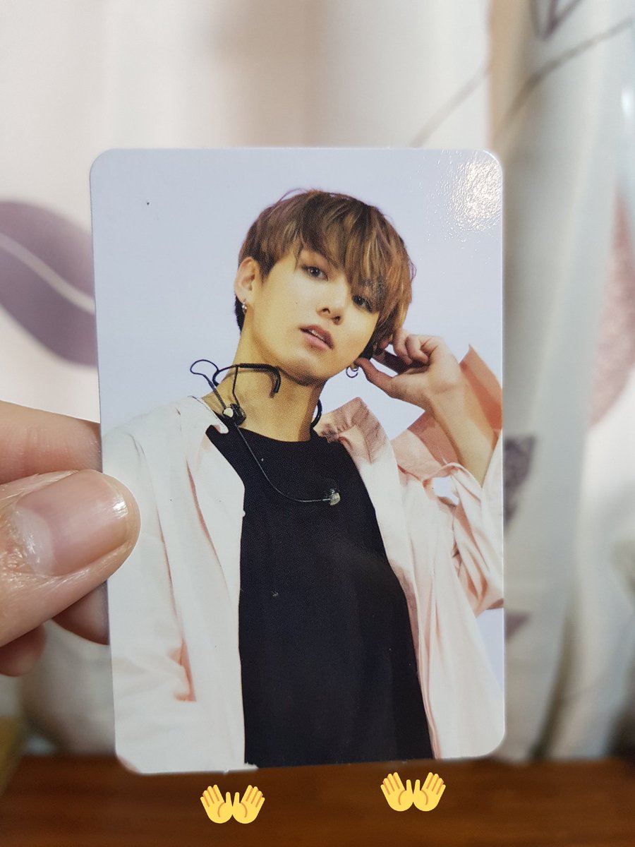 Specks are your friend For album and dvd photocards, look for the speck (the point in which the cards were cut) they are two dots/textures at any of the edges of the cards. You can feel for them. If it's there, then it's real.