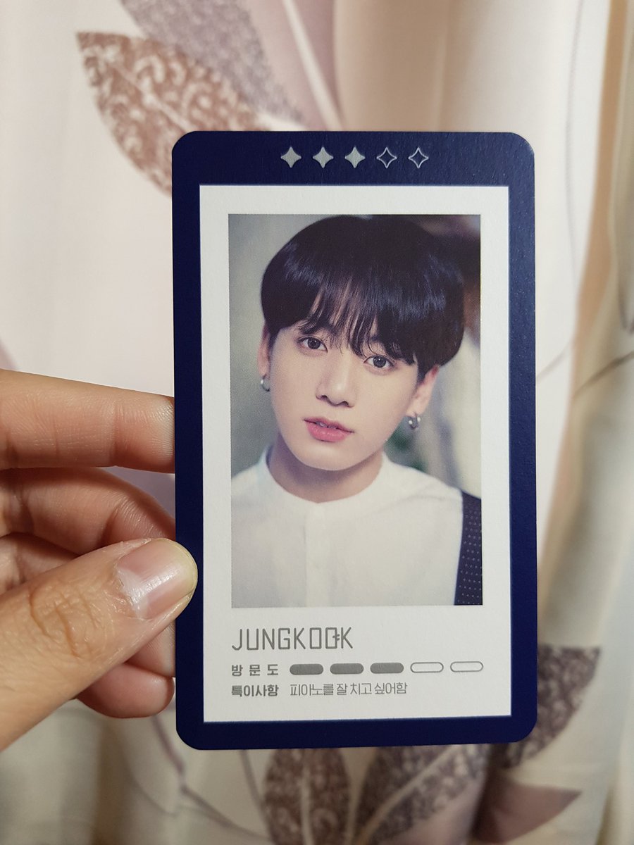 Playcards have a matte border and back, yet a glossy finish where the picture is. Similar to wings and young forever. The blue border has silver specks throughout. Similar to the silver text in the card.