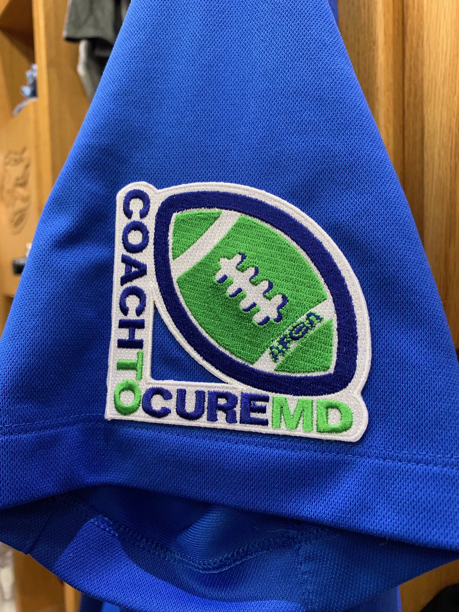 Coaches have their Coach To Cure MD patches on and are ready to go today. #TackleDuchenne