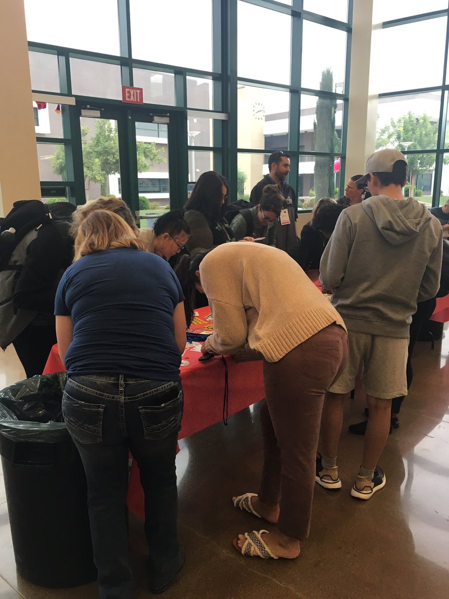 #edcampperris Teachers actively engaged already... creating their name badges! It’s going to be a great day!