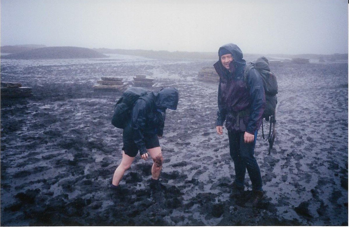 BigNick93904986's tweet photo. @moorsforfuture Took a while to find. This is Black Hill, Sept 2000. In the background are the paving slabs which had just been airlifted in awaiting installation. Pic taken in the shallowest bit of mud we could find! @peakdistrict @MoorCitizens difference is staggering, esp lack of bare peat https://t.co/gnYC5zIVkw