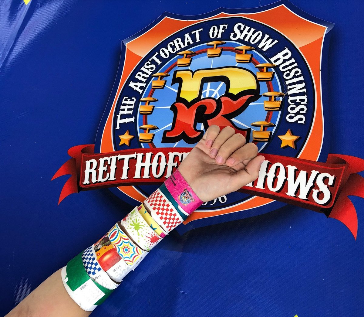 ReithofferShow's tweet photo. Diehard Fair Fan... she has her collection of wristbands from every day of the Fair! #LoveaFair #reithofferrocks #SouthPlainsFair2019 #wristbandsfordays https://t.co/LndYGDTSDB