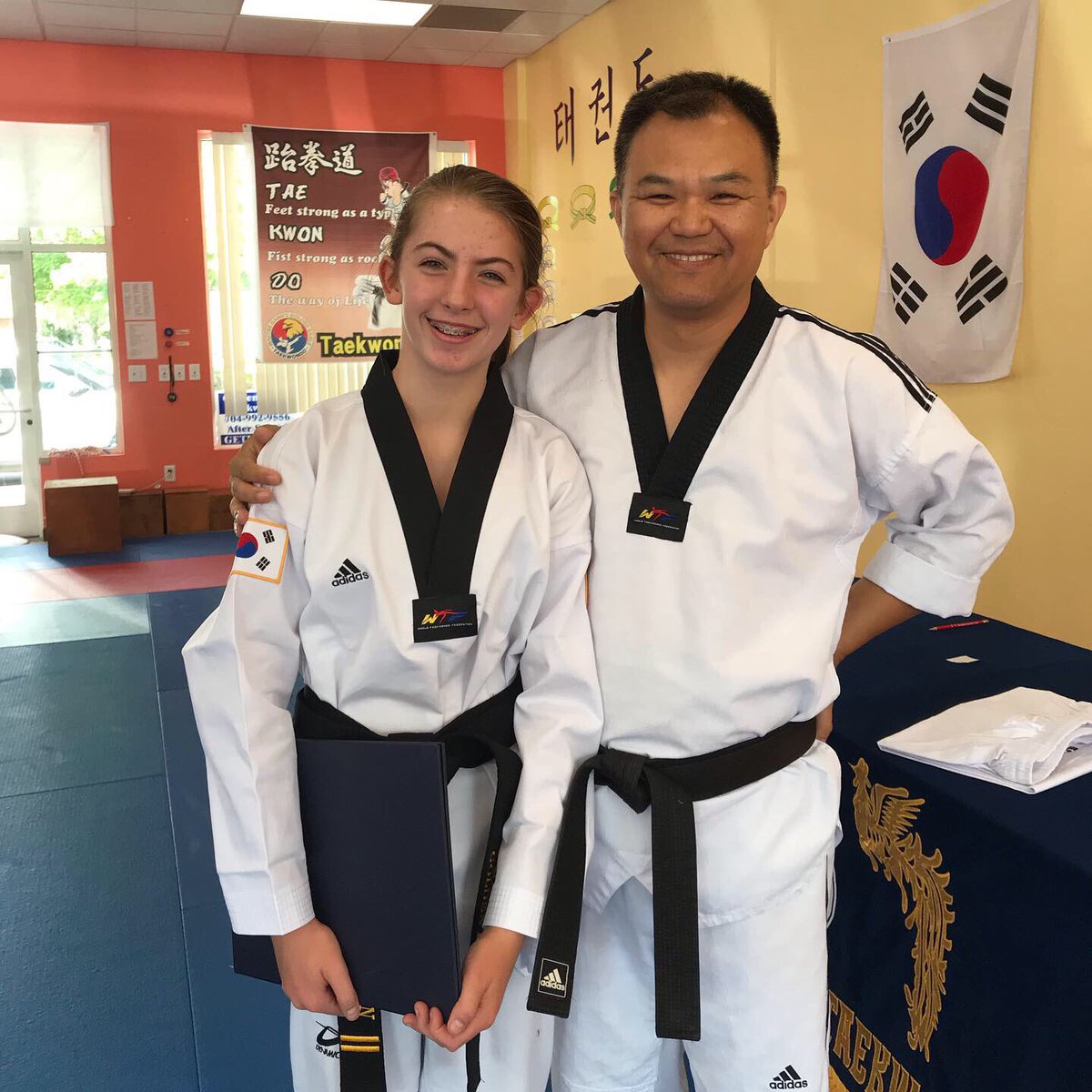 MandiHamlin's tweet photo. When my girl was just starting taekwondo a boy in her class whispered “you suck at this.” I’m not sure if she remembers it, but I sure do. He quit soon after and today she earned her 2nd degree black belt. 🥋💥 #girlpower #blackbelt https://t.co/Q7aa4aEzPu