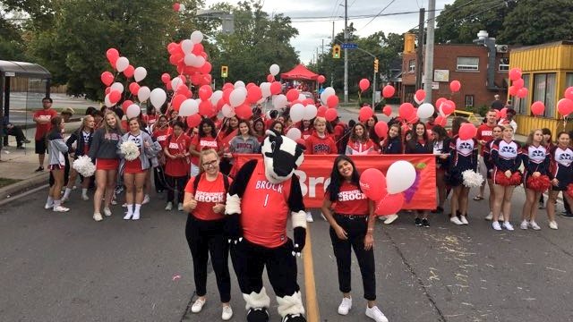 BrockUniversity's tweet photo. #BrockU was well represented by students, faculty and staff today in the @NiagaraWineFest #MeridianGrandeParade. We had a grape time! #OurHomeSTC https://t.co/CRXwtK2IIg