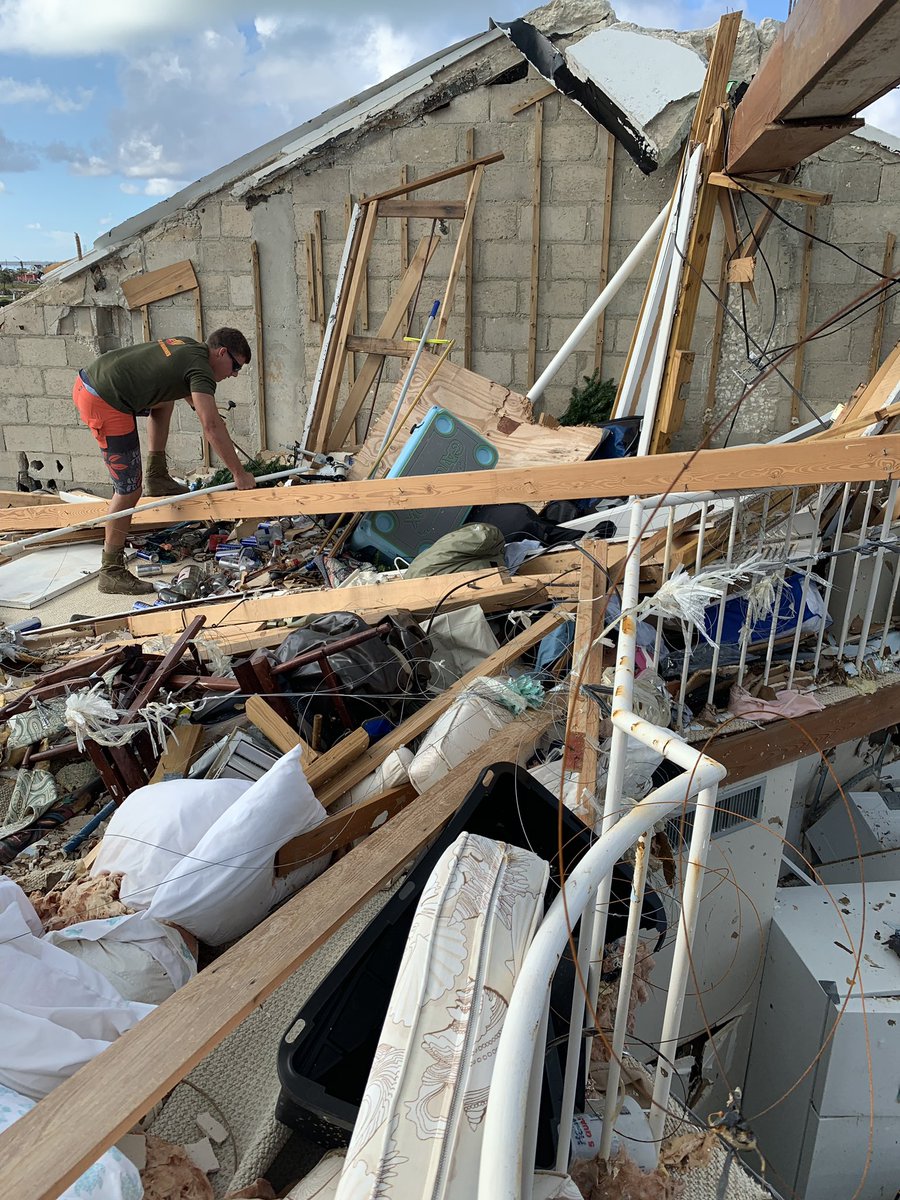 RobCribben's tweet photo. @TitosVodka @DirectRelief @TeamRubicon @SBPUSA @WCKitchen Quick story for @TitosVodka - this is a survivor of #HurricaneDorain in Treasure Cay Abacos! Our home was trashed like many others. The people of the Abacos are #abacostrong  - thank you for your support. BTW @TeamRubicon rocks!! https://t.co/CvsUFFnIvx