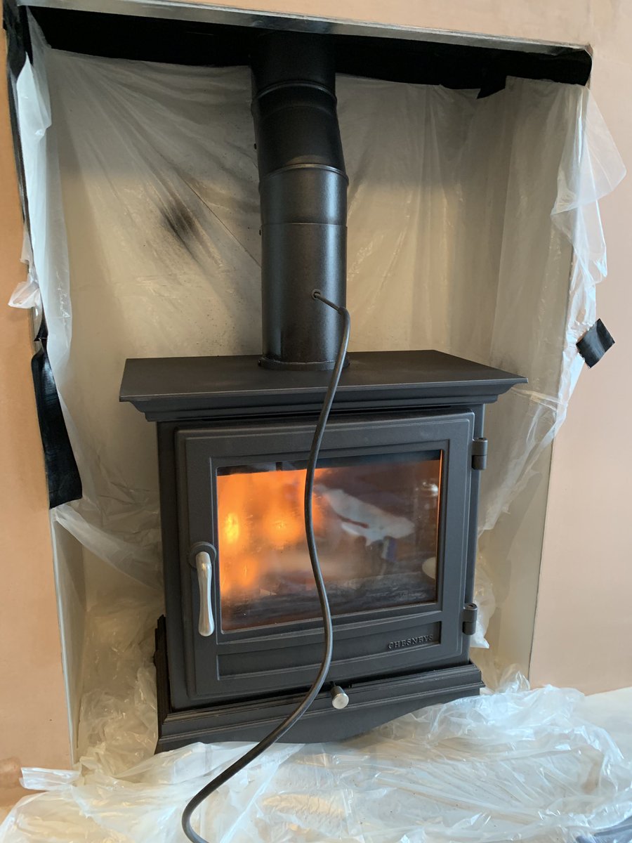 From unused fireplace to fantastic feature 🔥 <a href="/ChesneysLtd/">Chesneys London</a> Beaumont 5kw Ecodesign ready stove <a href="/specflue/">Specflue</a> flue liner system. Greek Palissandro white marble hearth cut and polished on site😍 Smooth board &amp; plaster finish. (Other trades to build cupboards and replace flooring)