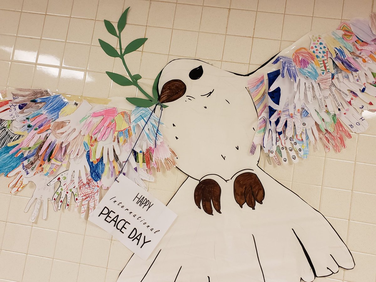 SCSDEnrichment's tweet image. Peaceful Schools at H. W. Smith last week had all students trace their hands to create large Peace doves for Peace day celebration.