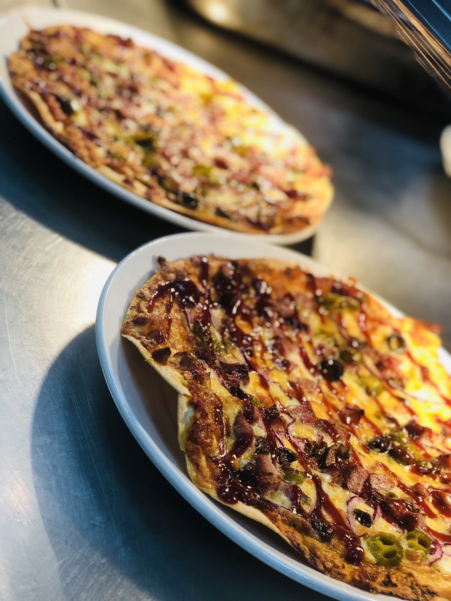 New on our menu is an Oven Baked Flatbread topped with Spicy Tomato Salsa, Sausage, Onions, Olives and Jalapeno’s finished with Cheddar and Mozzerella cheese and topped with a Spicy BBQ Sauce! It really is as good as it looks so make sure you come in and try it!?