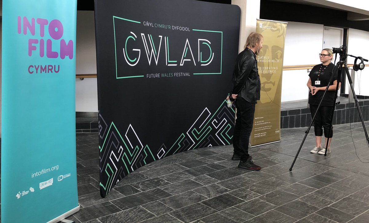 BAFTACymru's tweet image. Rhys Ifans has arrived at the Senedd in Cardiff! We are looking forward to hearing more from him about his memories of the journey to devolution here in Wales, and of course, his amazing career to date.
 
What is your favourite role Rhys has played on screen?
 
#Devolution20