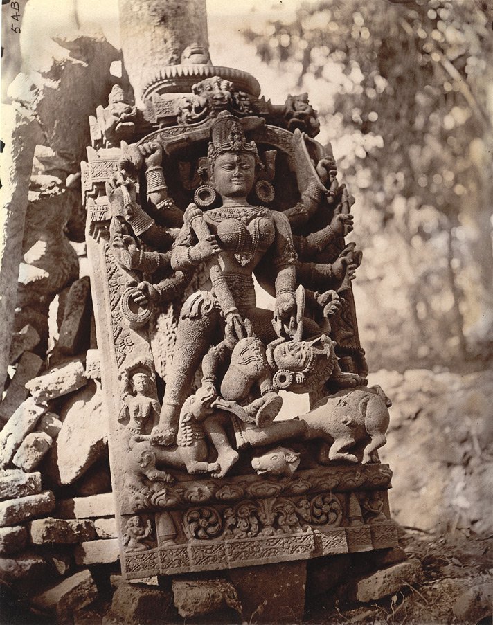 Photograph of a sculptured slab representing Durga slaying Mahisasura at Dulmi (Ramgarh  #Jharkhand) taken by Joseph David Beglar in 1872-73. 1865 Thomas Fraser Peppé wrote, about 10 armed Devi! @britishlibrary British officials intensively photographed such treasures.