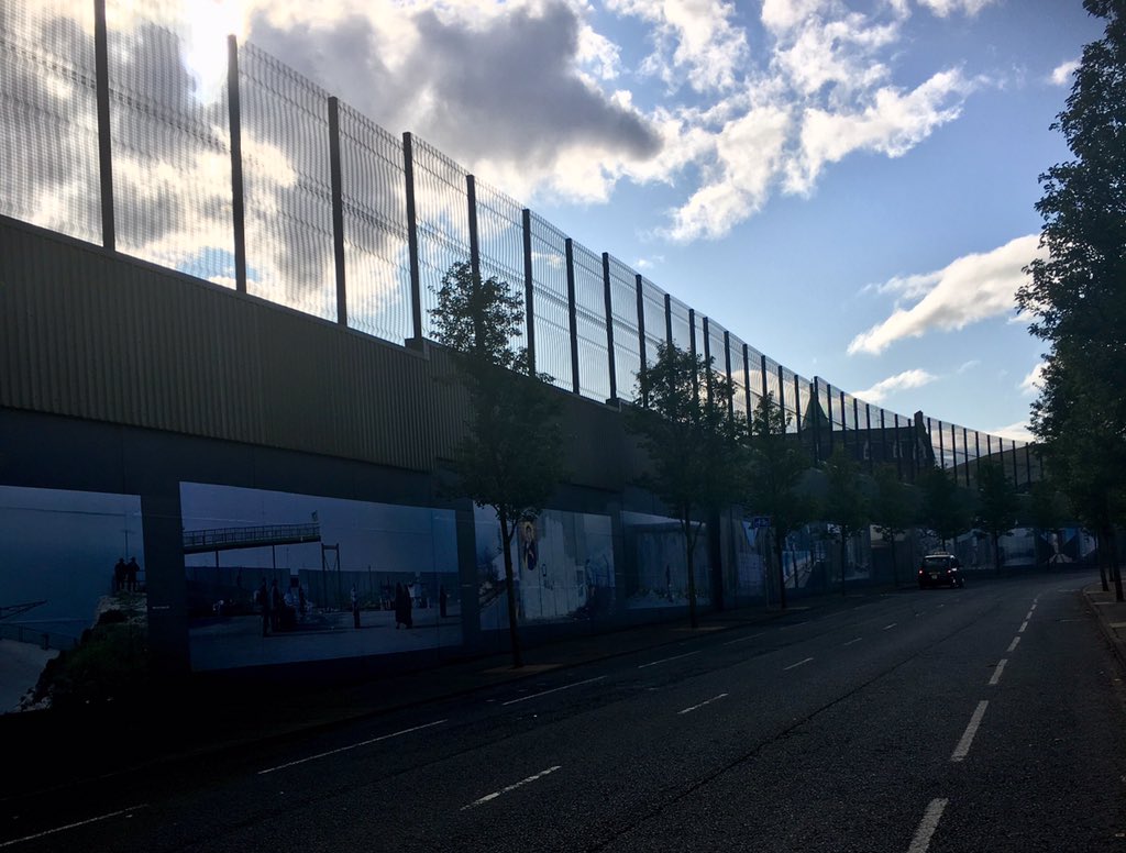 PaulaMcFetridge's tweet photo. Congratulations @drobbartist @BelfastExposed for #WallOnWall by Kai Wiedenhöfer, a powerful exhibition of boundary walls displayed on the ‘peace wall’ Cupar Way https://t.co/ajHXroiEZu https://t.co/vpD4ilFIyt
