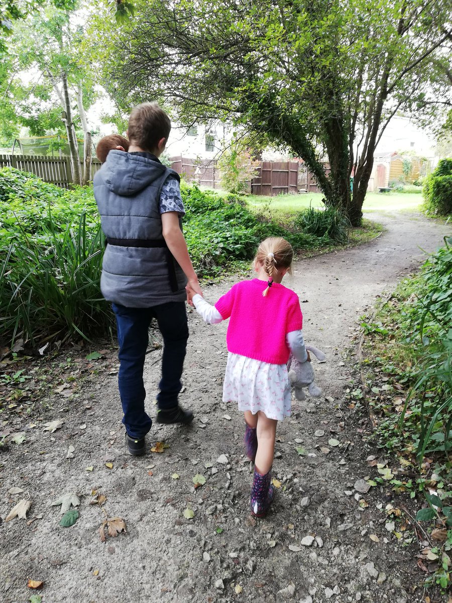 A guiding, loving hand from her big Brother.