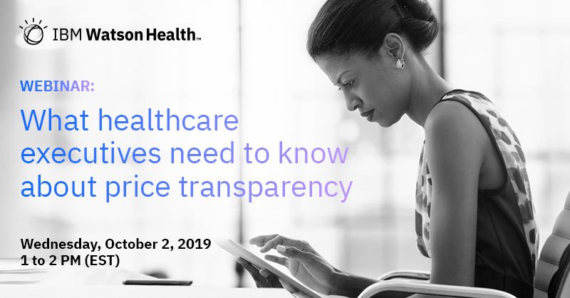 woman looking at tablet