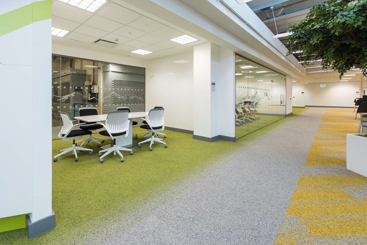 Who says #officedesign has to be full of muted colours? DESSO Fuse and Fields carpet tiles in vibrant colours were combined to create this stunning design. What do you think? #MondayMorning inspiration.