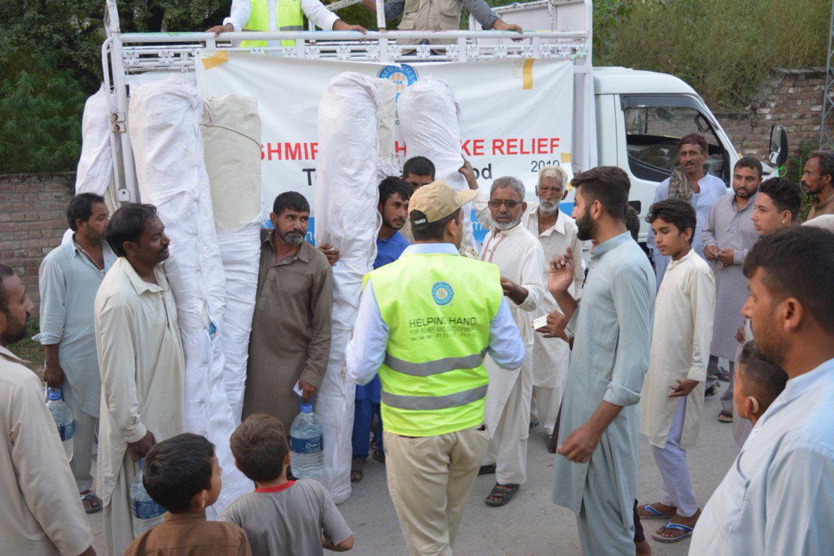 HelpingHandUSA's tweet photo. Our Emergency Response Team in Pakistan is working round the clock to help earthquake affected families receive tents, tarps, water and mosquito nets in Mirpur, Azad Kashmir. Your generosity has played a tremendous role in these efforts https://t.co/5OY4gVOLFN #DonationsAtWork https://t.co/x23i5CUTZZ