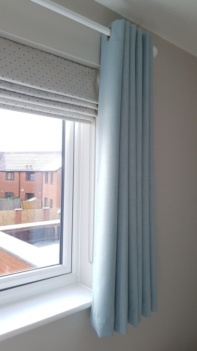 Black out Roman blinds with black out eyelet curtains = Maximum light blockage. Perfect for any nursery.  #clarkeandclarke