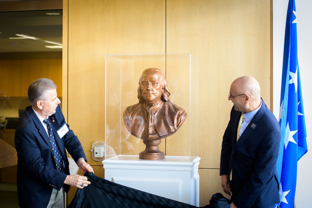 gwbusiness's tweet photo. Dean Anuj Mehrotra and alumnus Karl Boettcher unveiled an 18th century bust of Founding Father Benjamin Franklin this past #ColonialsWeekend. Stop by the 6th floor lobby of Duquès Hall to check it out! https://t.co/UbzabWfRSB