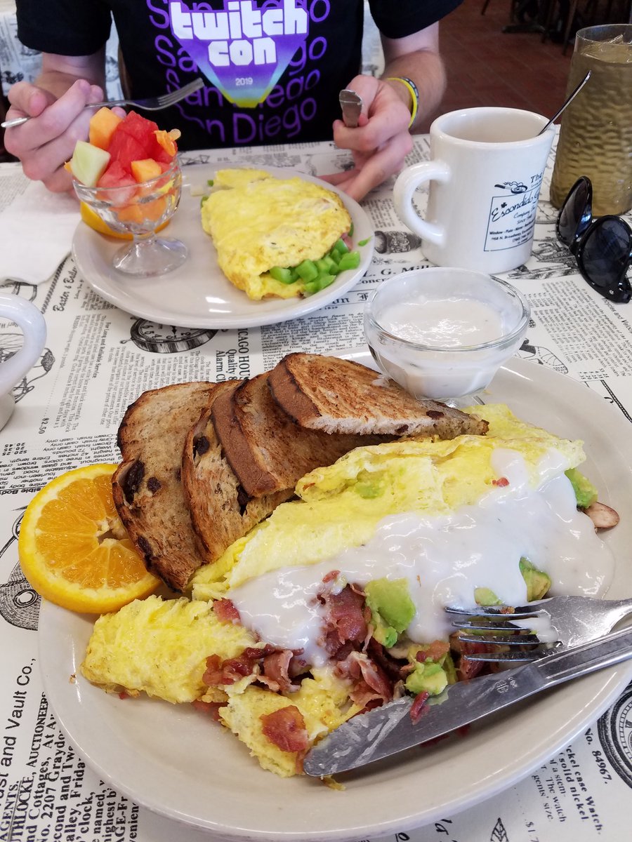 RenyMokiro's tweet photo. Post @TwitchCon breakfast/brunch with @Wrezl My avocado, bacon, and mushroom omelet from @BrokenYolkCafe is large and delicious. Waitress asked which cheese I wanted, I said "the no cheese one" 😅 I got the mushroom sauce. Yummy!
#ESOZerg #CaptMokiro #ESOFam https://t.co/kPGItB6Kf2
