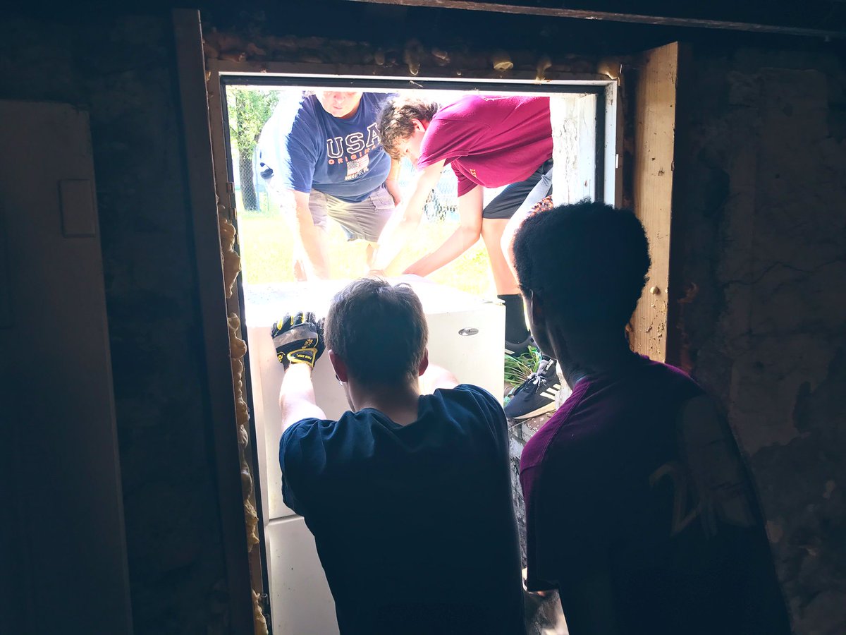 grand_north's tweet photo. Sophomores from De Smet @DeSmetJesuitHS spend a day of service helping to get a property ready for a new family. Great work gentlemen! https://t.co/E9GRSOes9T