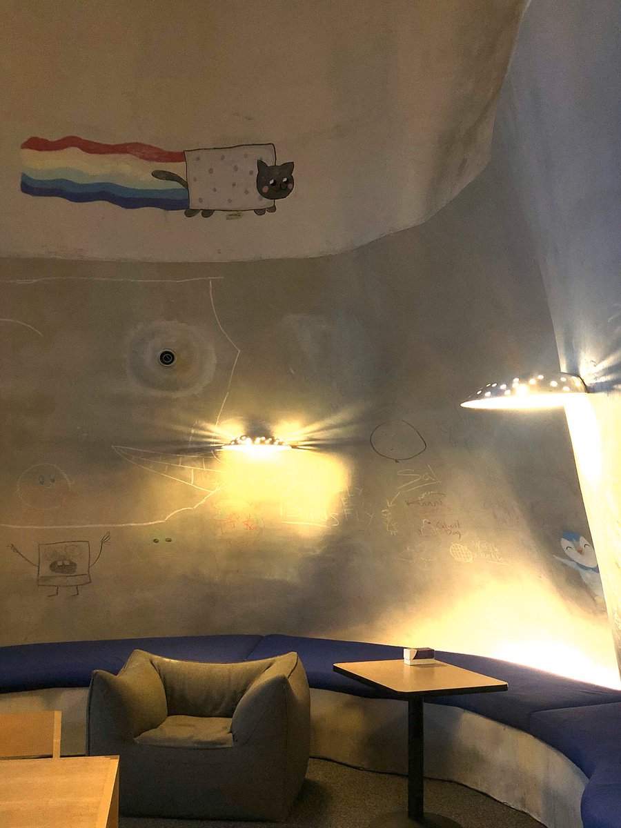 wall paintings at Simmons study lounge: usually cartoons and colorful math equations. The room is pretty much colorless except the paintings. Expanding on the last tweet that colors bring vibrancy, such energy often stems from the human mind and imagination.  #wherearethecolors