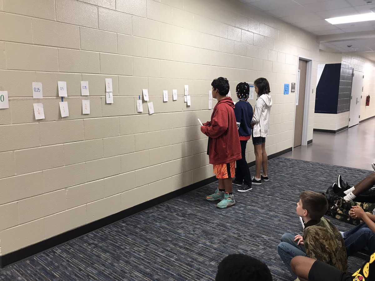 Every year my partner <a href="/celladphillips/">Marcella Phillips</a> and I build an oversized number line with our students using whole numbers, decimals, mixed numbers, and improper and proper fractions! 🙌🏼It’s amazing to hear the students’ conversations as they make connections! #GEinspires <a href="/Golbowtweets/">Golbowtweets</a>